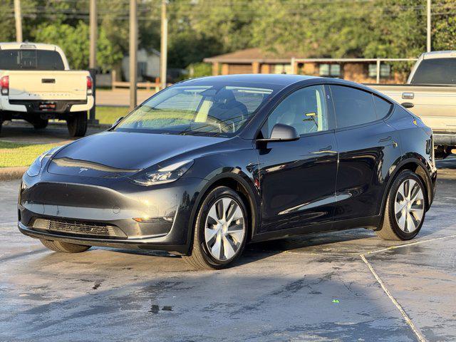 used 2024 Tesla Model Y car, priced at $30,000