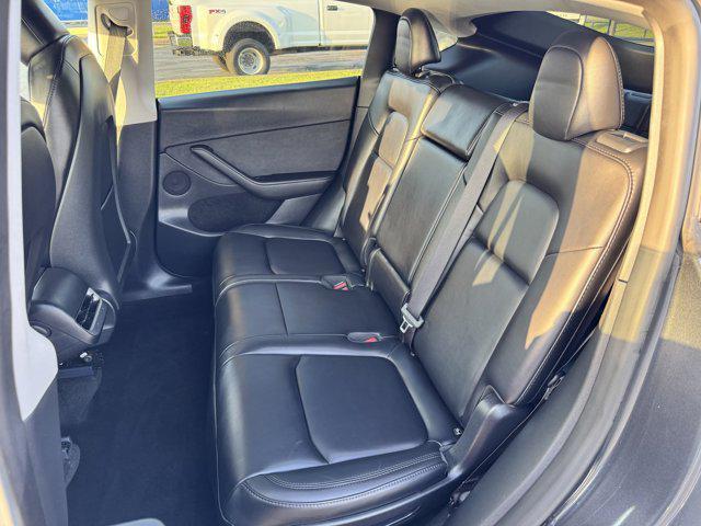 used 2024 Tesla Model Y car, priced at $30,000