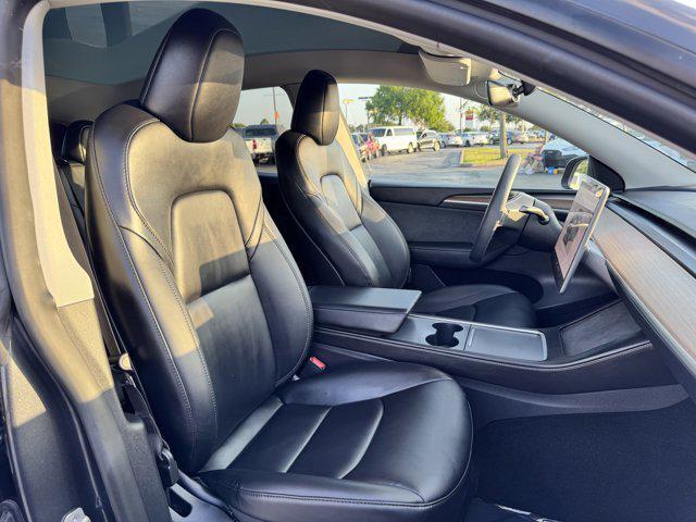 used 2024 Tesla Model Y car, priced at $30,000