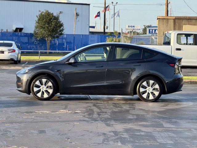 used 2024 Tesla Model Y car, priced at $30,000