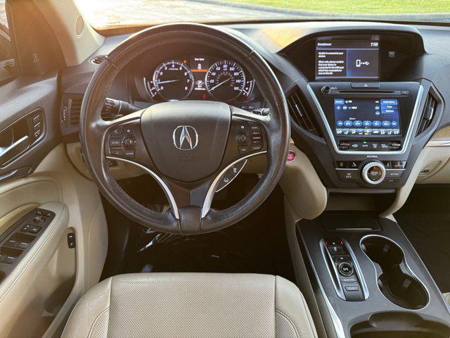 used 2020 Acura MDX car, priced at $25,000