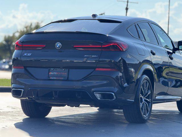 used 2025 BMW X6 car, priced at $57,500