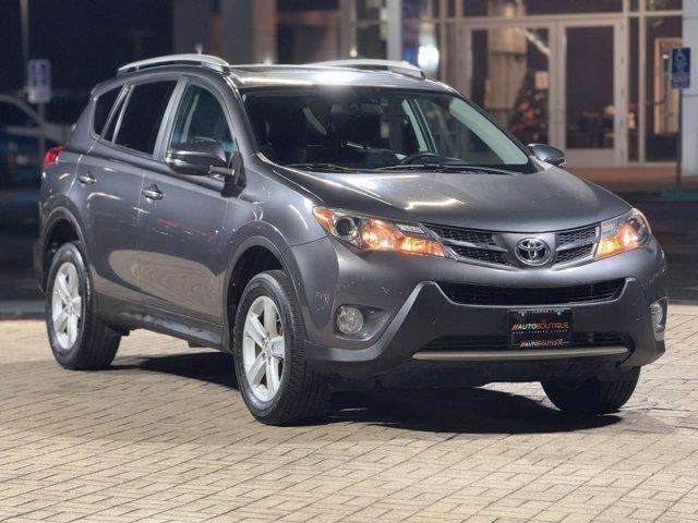 used 2013 Toyota RAV4 car, priced at $13,000