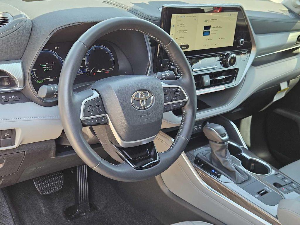 used 2024 Toyota Highlander Hybrid car, priced at $53,174