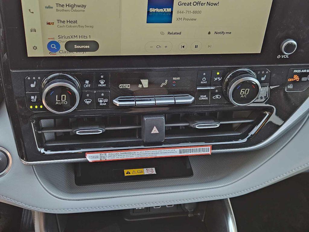 used 2024 Toyota Highlander Hybrid car, priced at $53,174