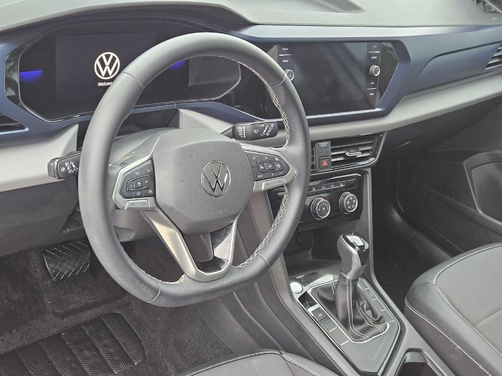 used 2023 Volkswagen Taos car, priced at $24,450