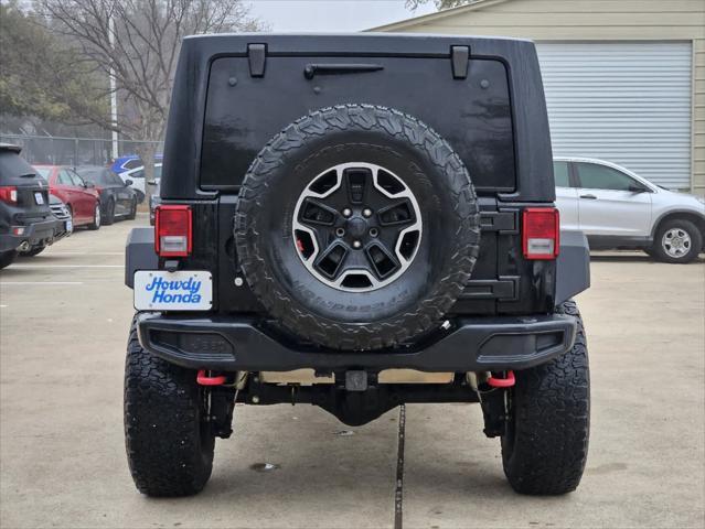 used 2016 Jeep Wrangler Unlimited car, priced at $22,604