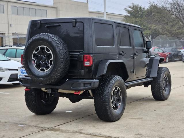 used 2016 Jeep Wrangler Unlimited car, priced at $22,604