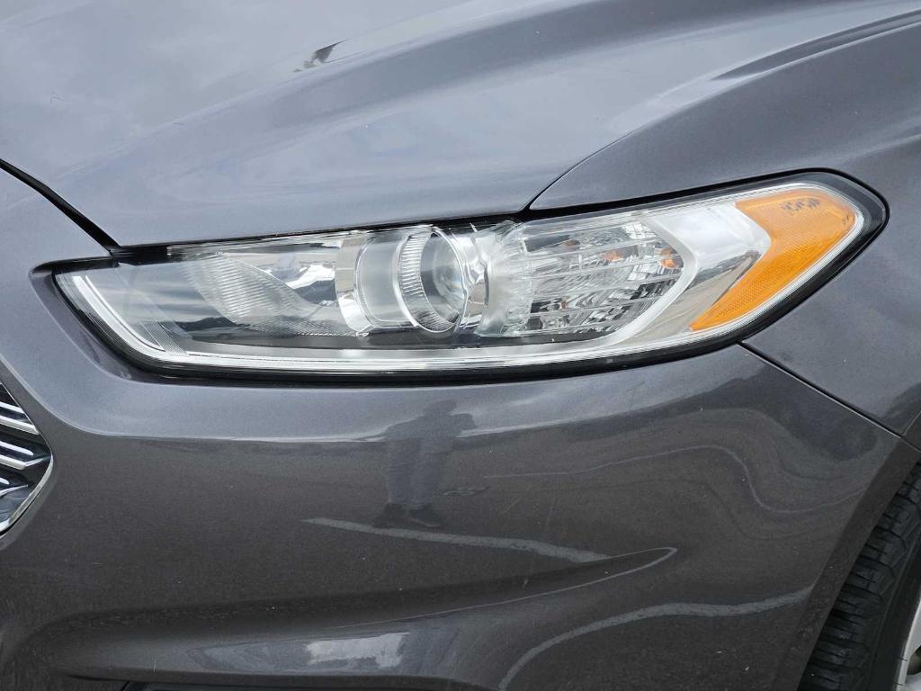 used 2016 Ford Fusion car, priced at $10,897