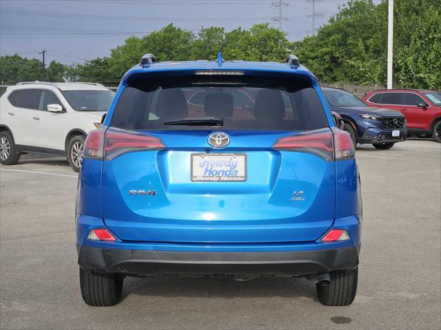 used 2016 Toyota RAV4 car, priced at $16,999