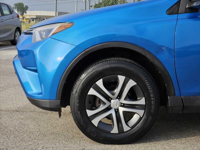 used 2016 Toyota RAV4 car, priced at $16,999