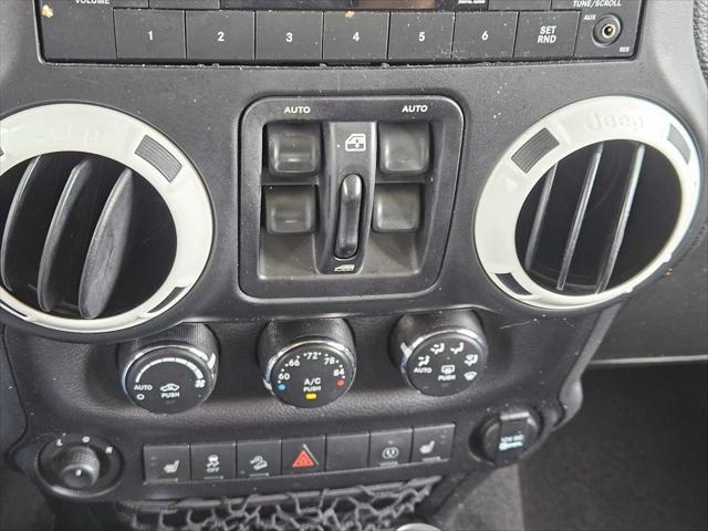 used 2015 Jeep Wrangler Unlimited car, priced at $19,650