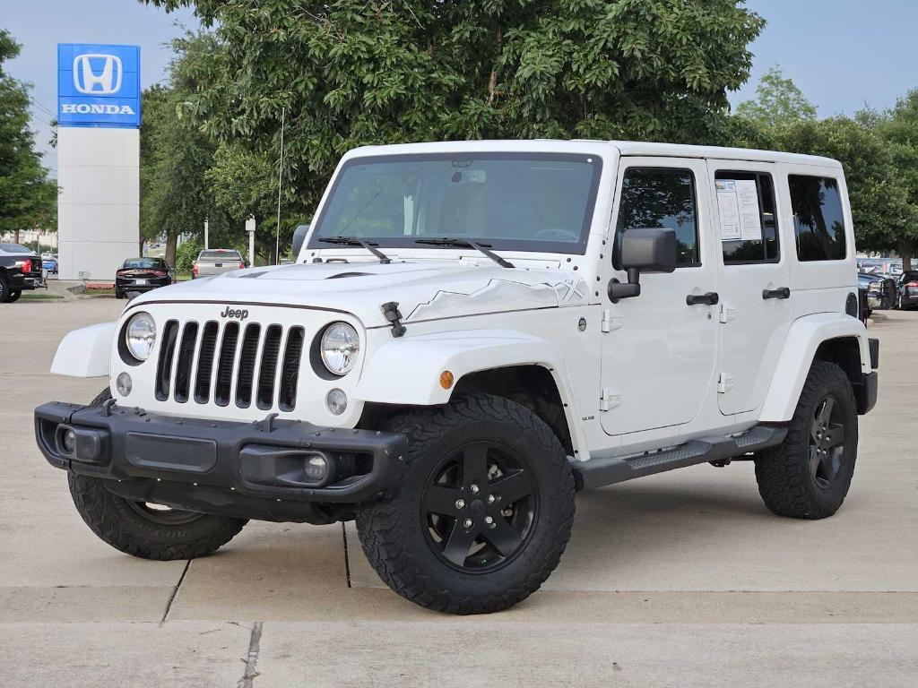 used 2015 Jeep Wrangler Unlimited car, priced at $18,406