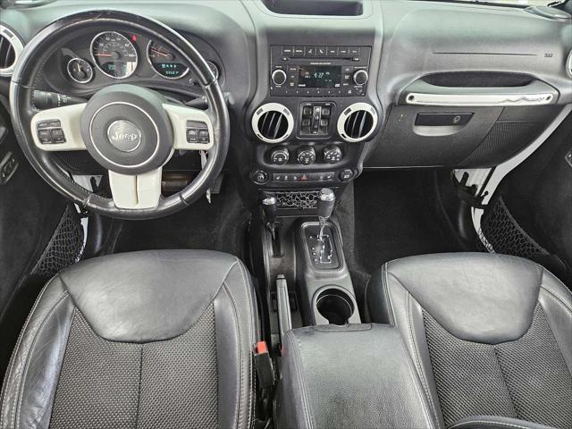 used 2015 Jeep Wrangler Unlimited car, priced at $19,650