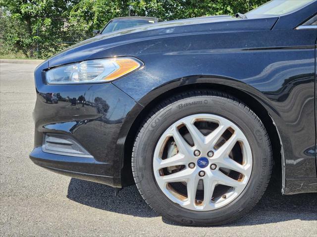 used 2016 Ford Fusion car, priced at $9,999