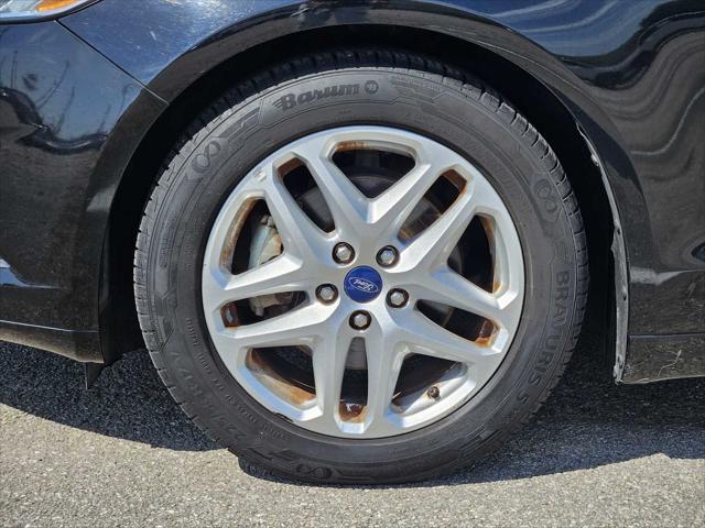 used 2016 Ford Fusion car, priced at $9,999