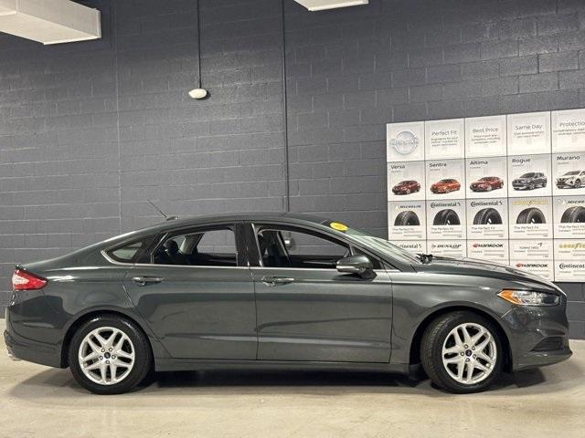 used 2016 Ford Fusion car, priced at $6,991