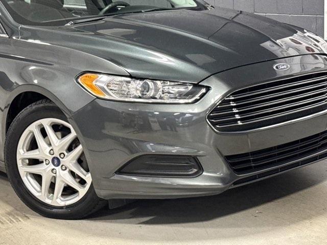 used 2016 Ford Fusion car, priced at $6,991