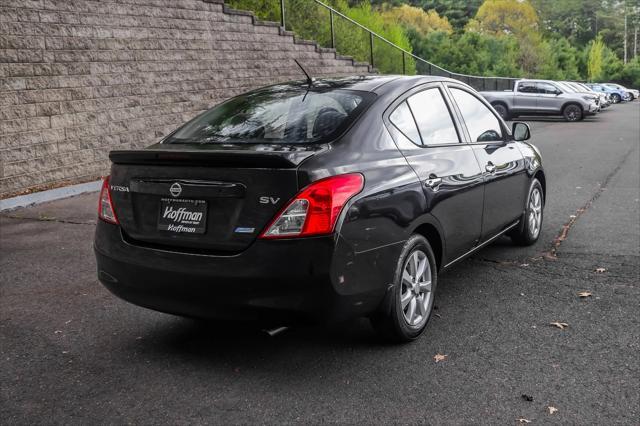 used 2014 Nissan Versa car, priced at $5,000