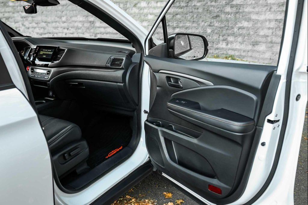 used 2023 Honda Passport car, priced at $33,500