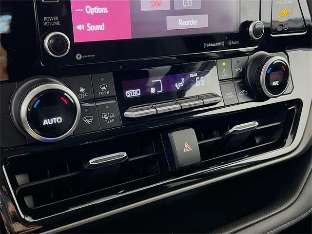 used 2021 Toyota Highlander car, priced at $24,000