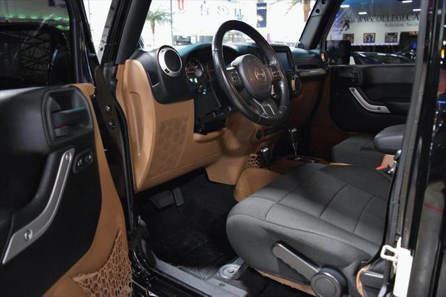 used 2012 Jeep Wrangler Unlimited car, priced at $22,985