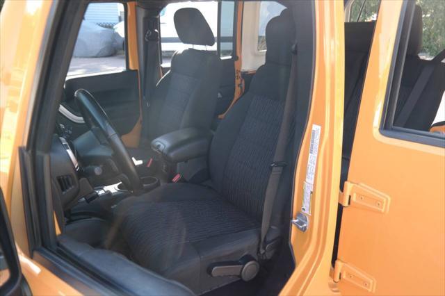 used 2012 Jeep Wrangler Unlimited car, priced at $17,900