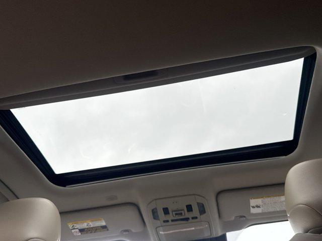 used 2021 Toyota Highlander Hybrid car, priced at $31,000