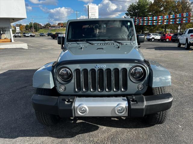 used 2015 Jeep Wrangler car, priced at $21,873