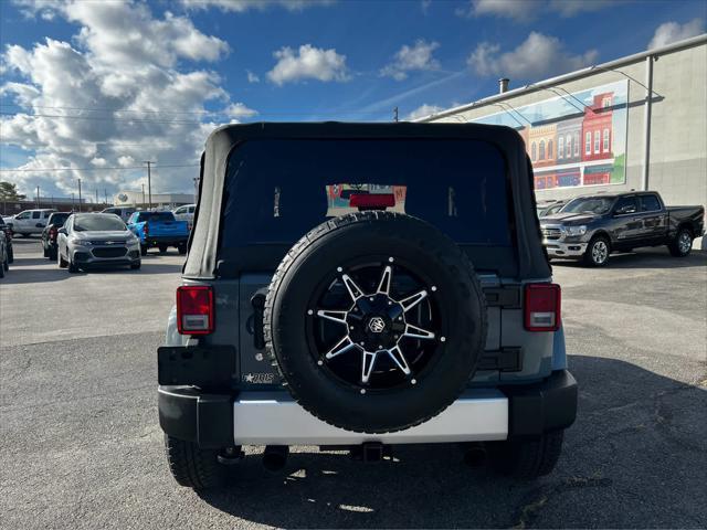 used 2015 Jeep Wrangler car, priced at $21,873