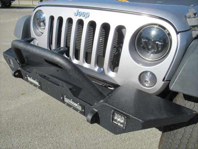 used 2014 Jeep Wrangler Unlimited car, priced at $14,775