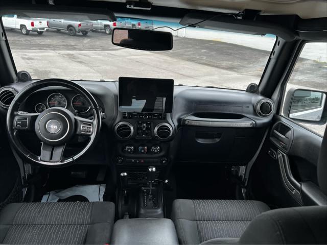 used 2011 Jeep Wrangler Unlimited car, priced at $14,354