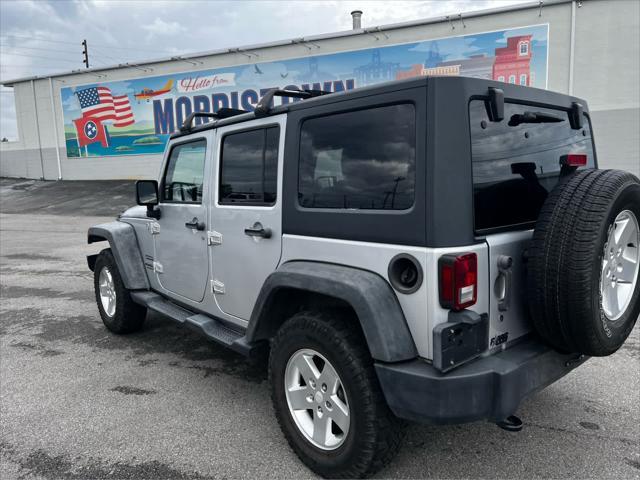 used 2011 Jeep Wrangler Unlimited car, priced at $14,354