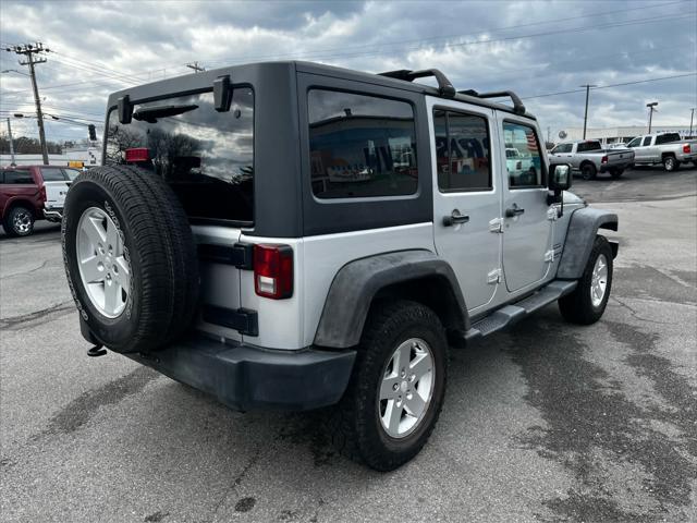 used 2011 Jeep Wrangler Unlimited car, priced at $14,354