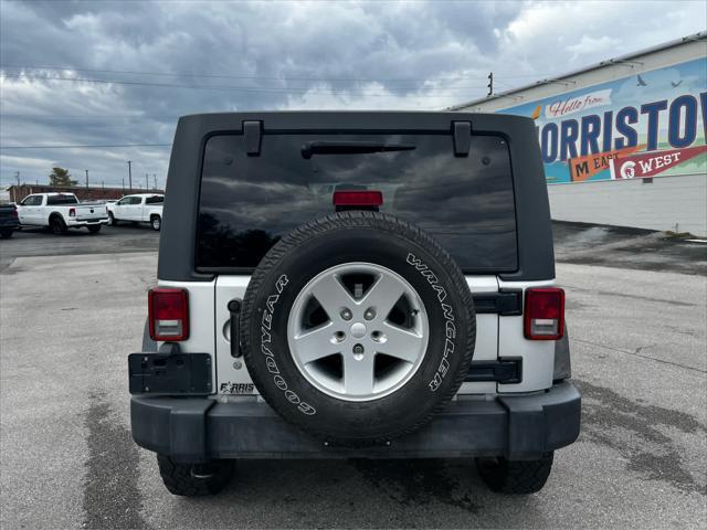 used 2011 Jeep Wrangler Unlimited car, priced at $14,354