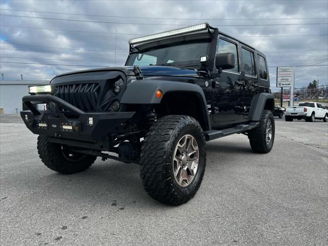 used 2013 Jeep Wrangler Unlimited car, priced at $13,448