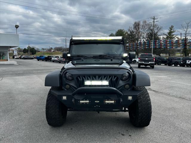 used 2013 Jeep Wrangler Unlimited car, priced at $13,448