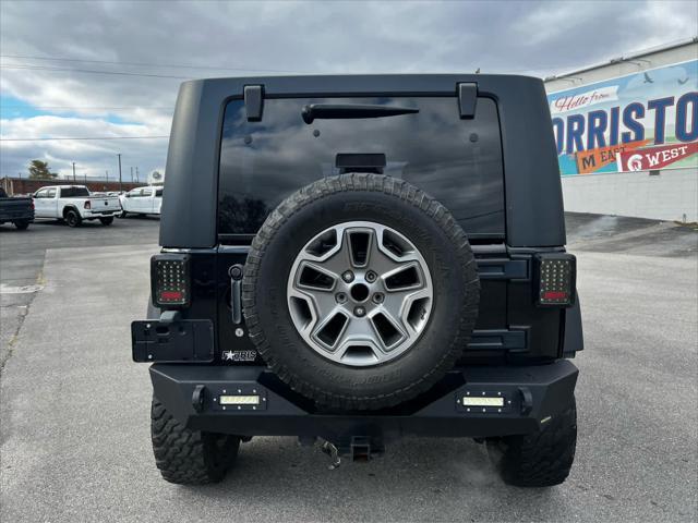 used 2013 Jeep Wrangler Unlimited car, priced at $13,448