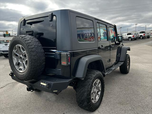 used 2013 Jeep Wrangler Unlimited car, priced at $13,448