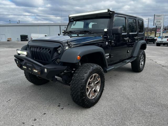 used 2013 Jeep Wrangler Unlimited car, priced at $13,448