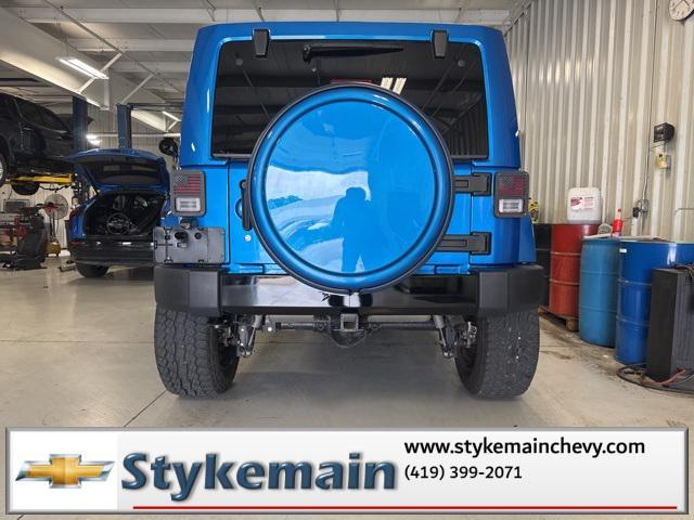 used 2014 Jeep Wrangler Unlimited car, priced at $31,000