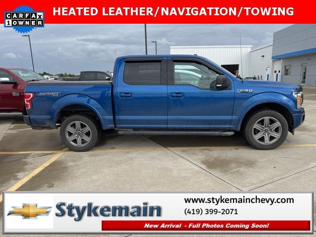 used 2018 Ford F-150 car, priced at $23,463
