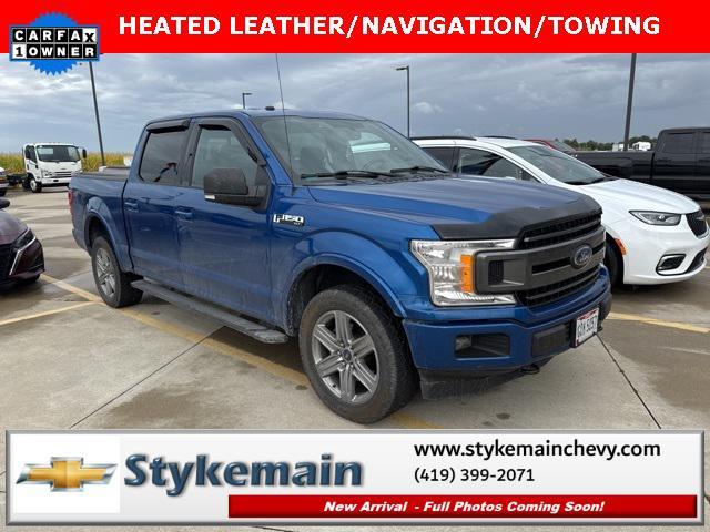 used 2018 Ford F-150 car, priced at $23,463