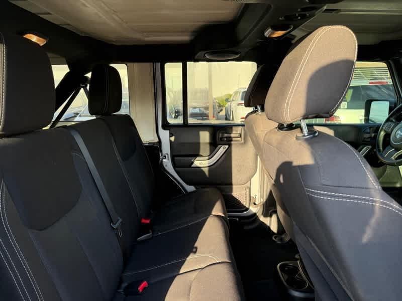 used 2014 Jeep Wrangler Unlimited car, priced at $14,518