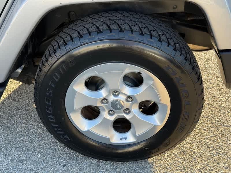 used 2014 Jeep Wrangler Unlimited car, priced at $14,518