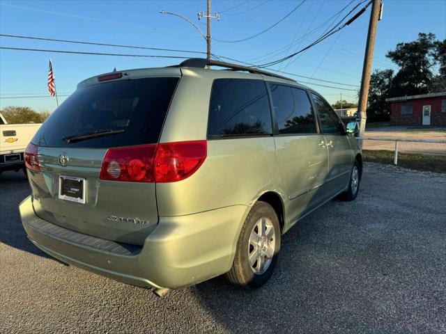 used 2010 Toyota Sienna car, priced at $9,995