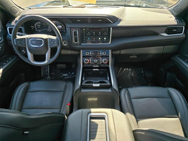used 2024 GMC Yukon XL car, priced at $77,840