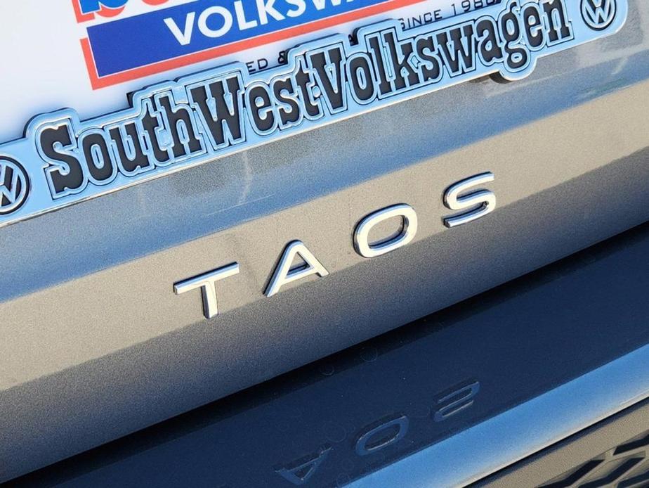 used 2023 Volkswagen Taos car, priced at $29,071