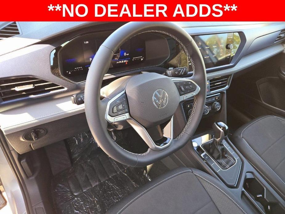 new 2024 Volkswagen Taos car, priced at $28,057