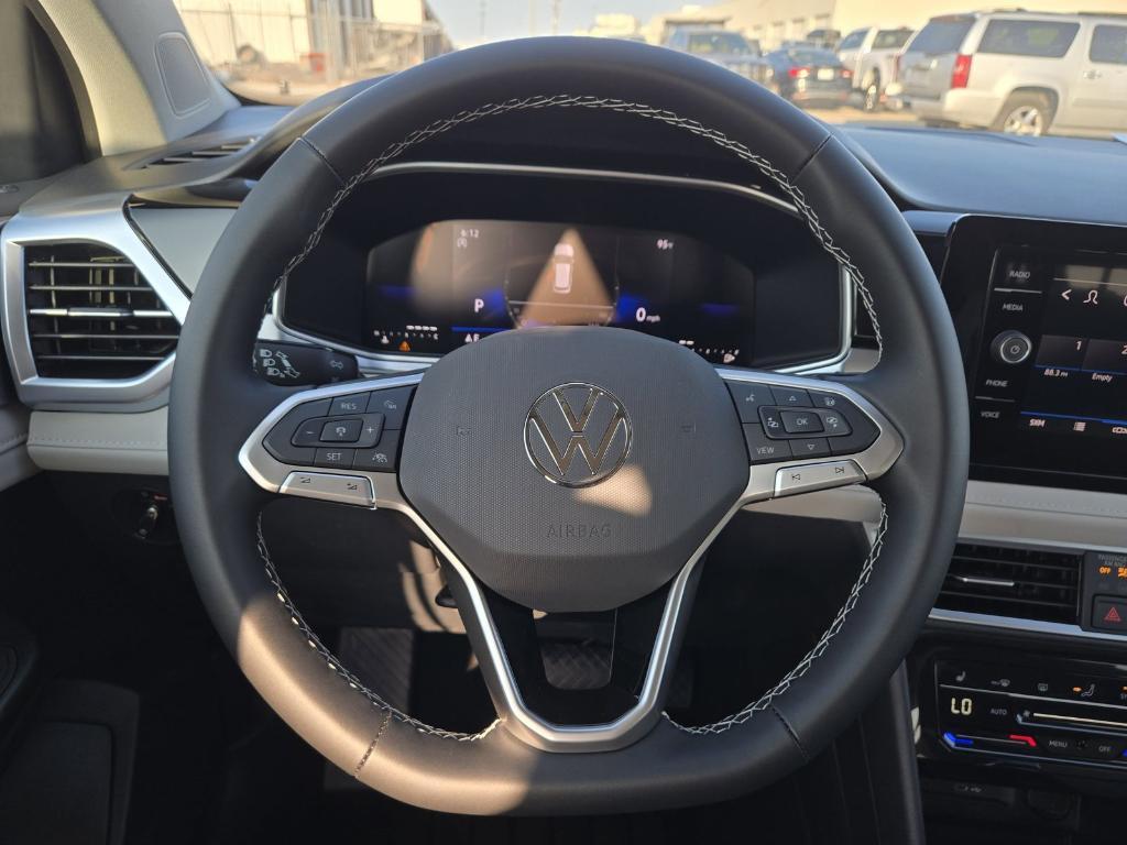new 2025 Volkswagen Taos car, priced at $26,678